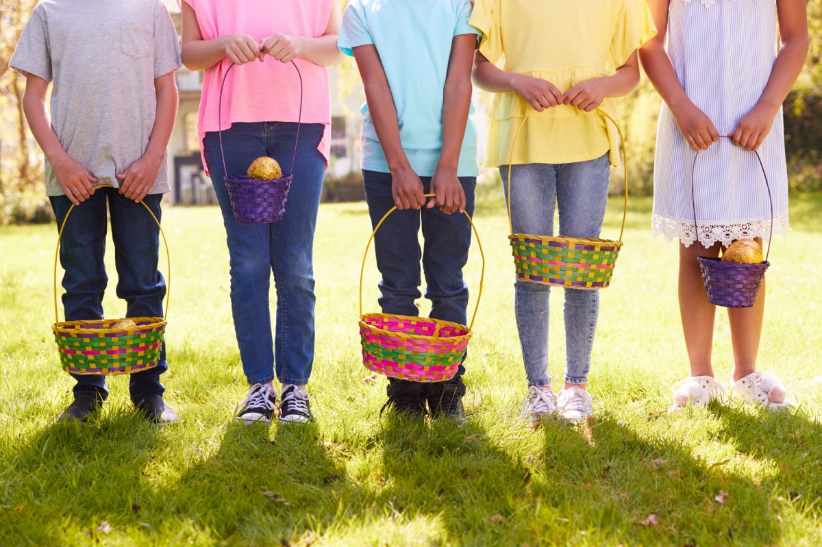 five children holding easter baskets